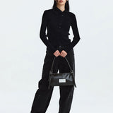 BUCKLE STRAP SHOULDER BAG IN BLACK