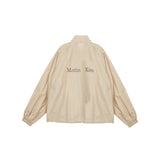 MATIN KIM LOGO COATING JUMPER IN BEIGE